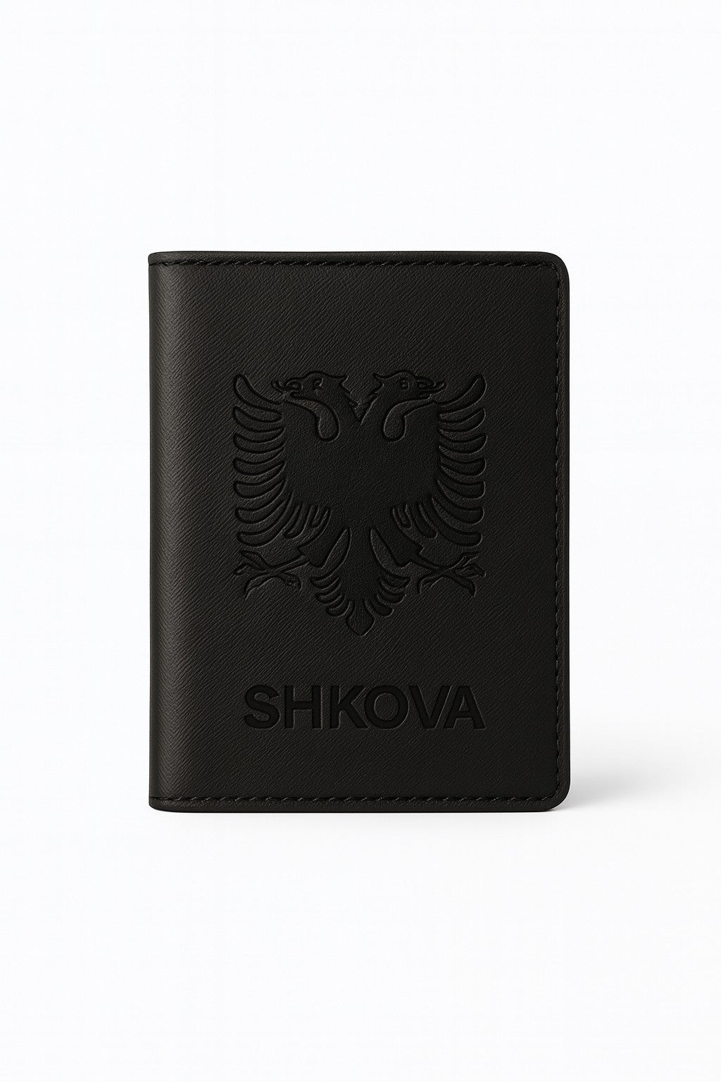 Black leather wallet with embossed design and 'SHKOVA' branding on a white background