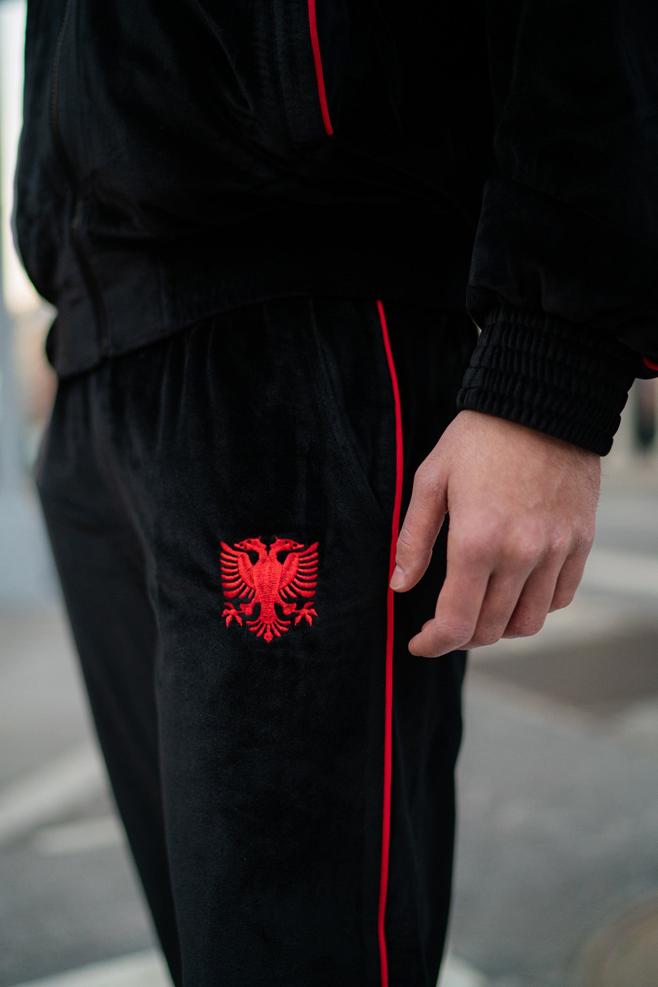 ALBANIAN VELOUR PANTS - RED STITCH