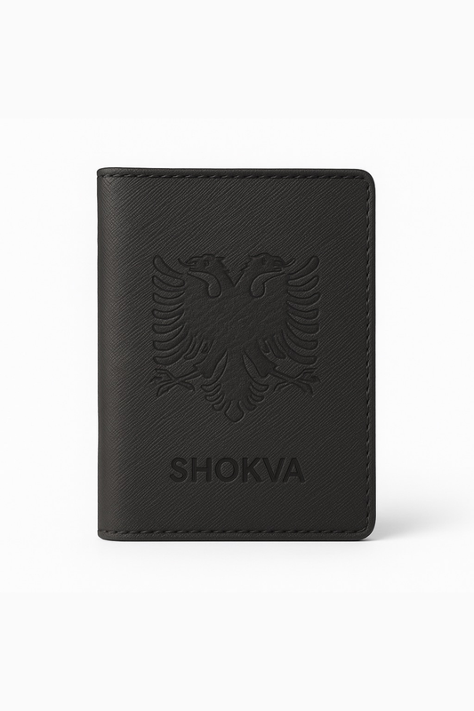 Black leather wallet with embossed logo and 'SHOKVA' branding on a white background