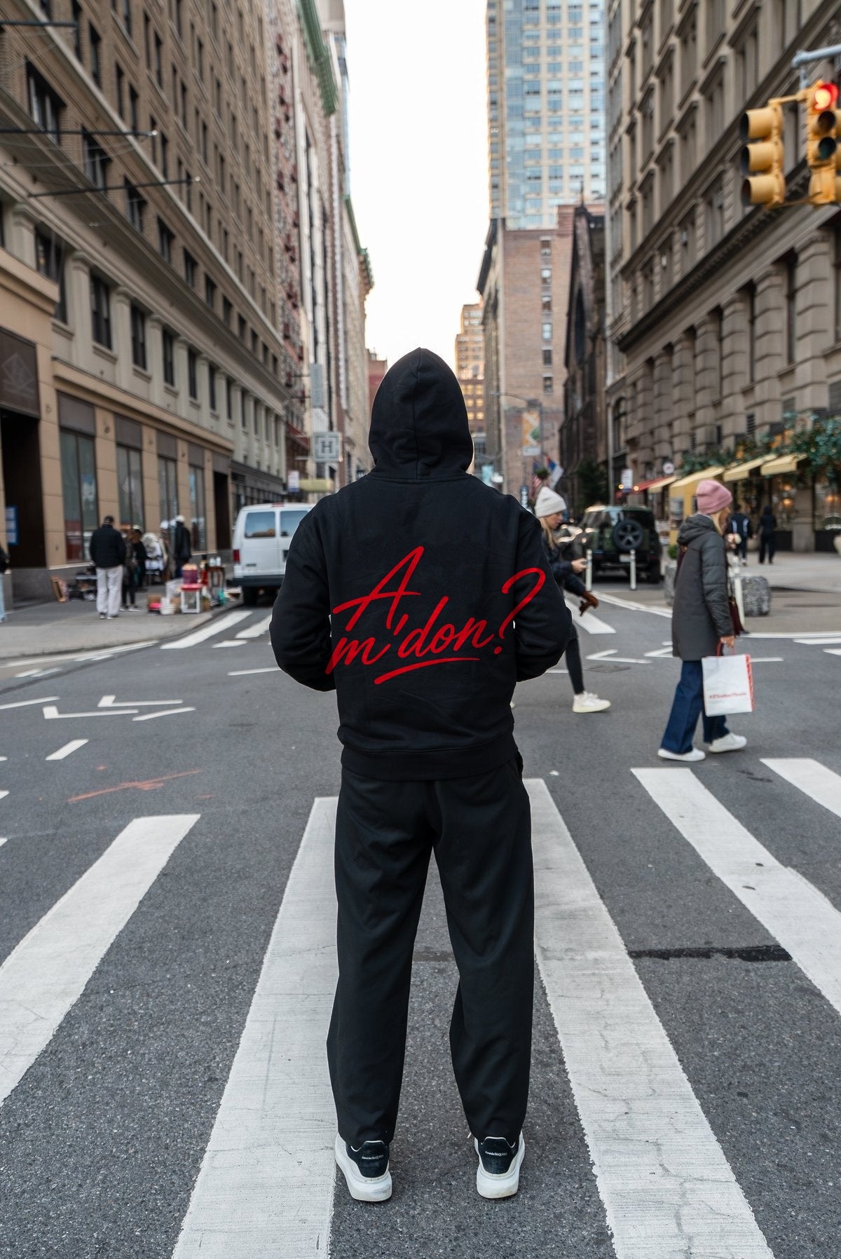 A'mdon? Hoodie worn on a New York City crosswalk, back view