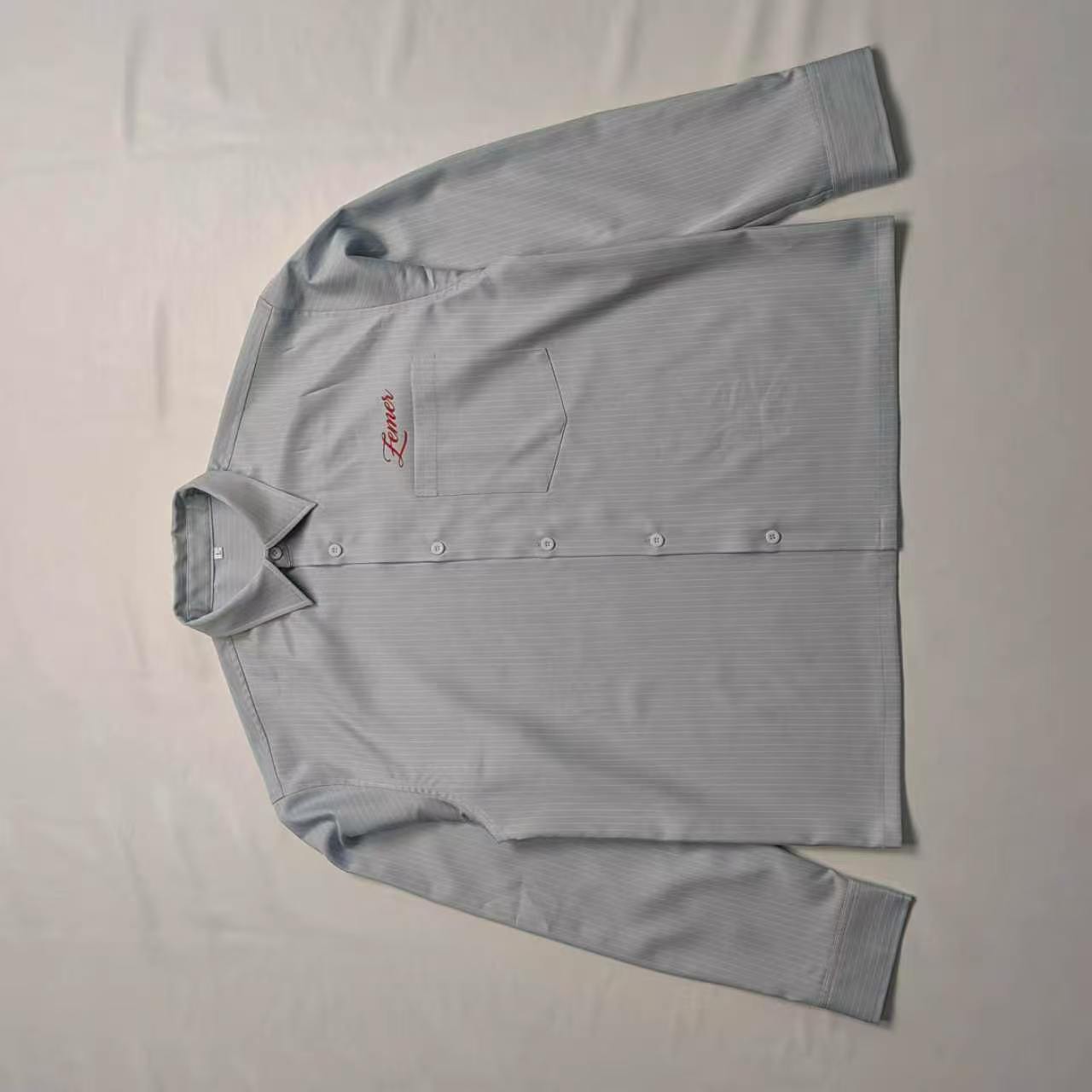 Albanian Eagle Crop Shirt — front, Zemer script chest graphic (baby blue pinstripe)