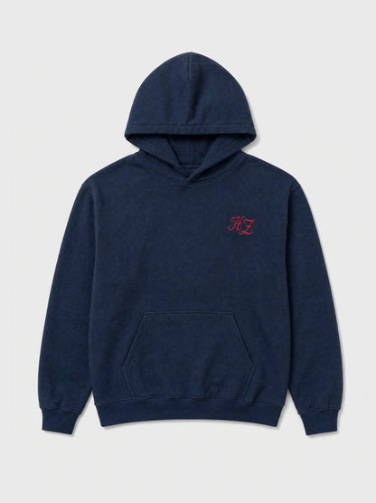Design preview: Hajde Zemer HZ Essential Eagle Hoodie in blue navy, front flat lay with the small red HZ mark at the chest