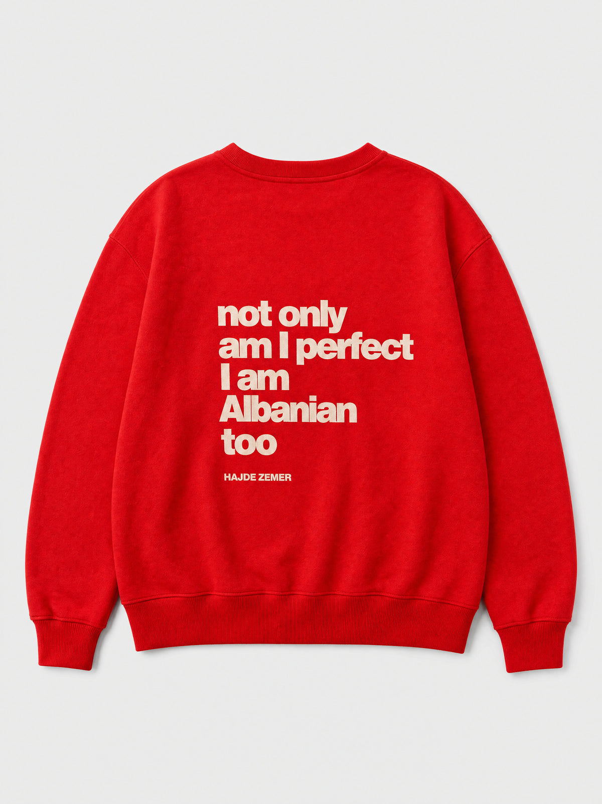 Hajde Zemer red crewneck laid flat, back view, white text reading not only am I perfect I am Albanian too