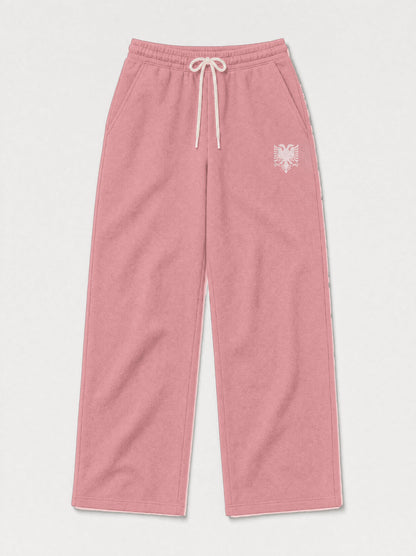 Design preview: Hajde Zemer HZ Essential Eagle Sweatpants in dusty rose pink, front flat lay with the cream drawcord and the cream double-headed eagle at one hip