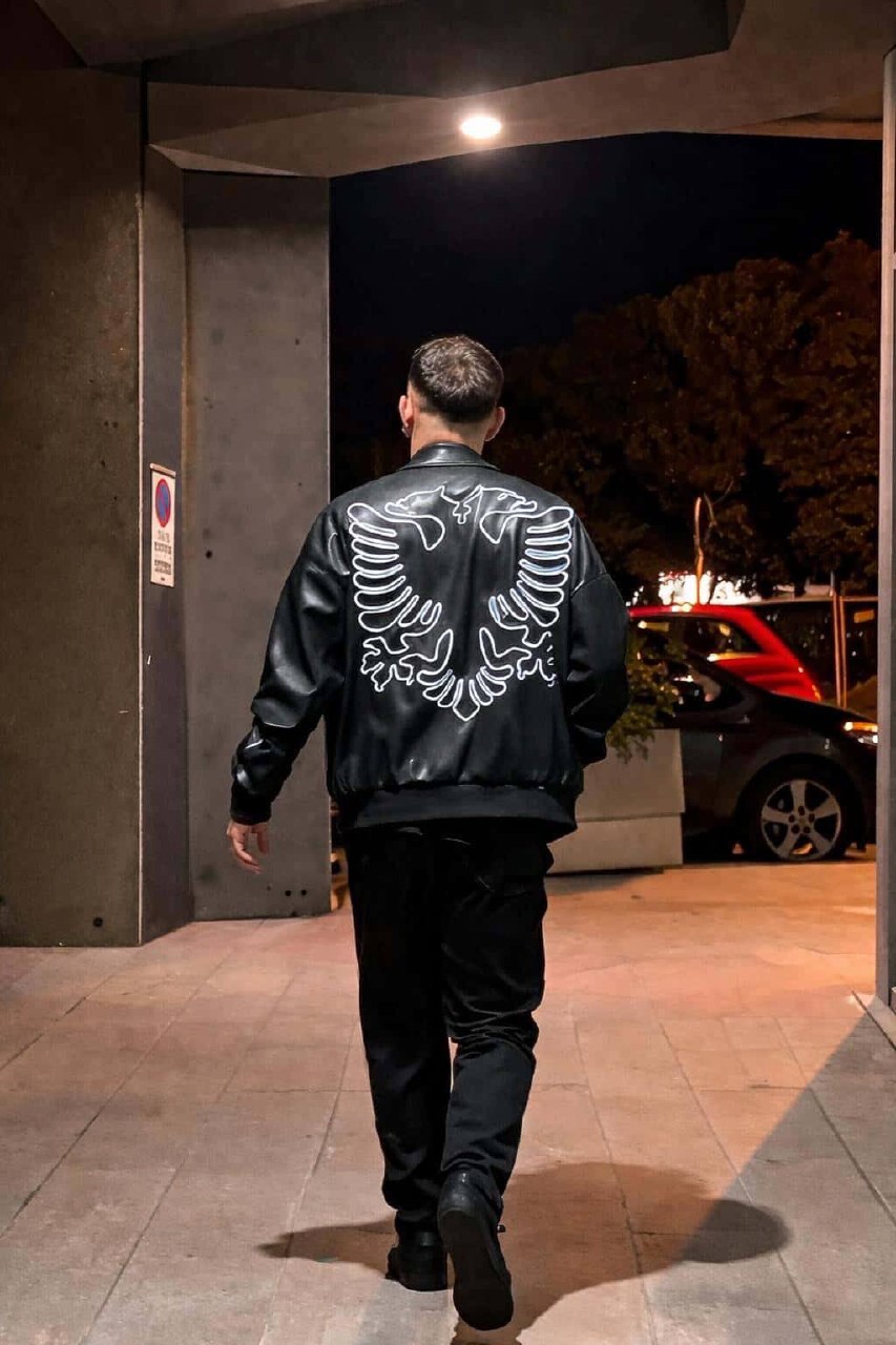 Domeniko Cupi wearing Albanian Black Eagle Jacket at night