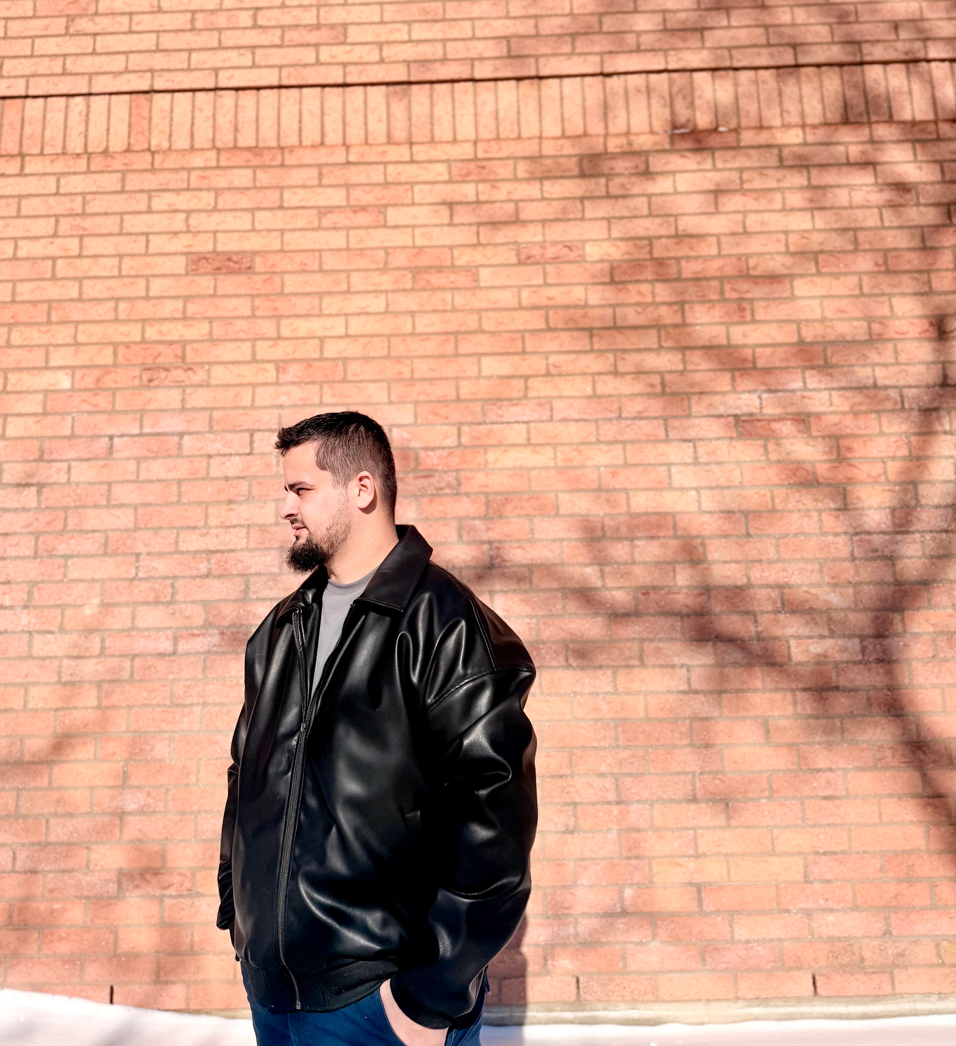 UGC - Sadikshya in Eagle Jacket brick wall