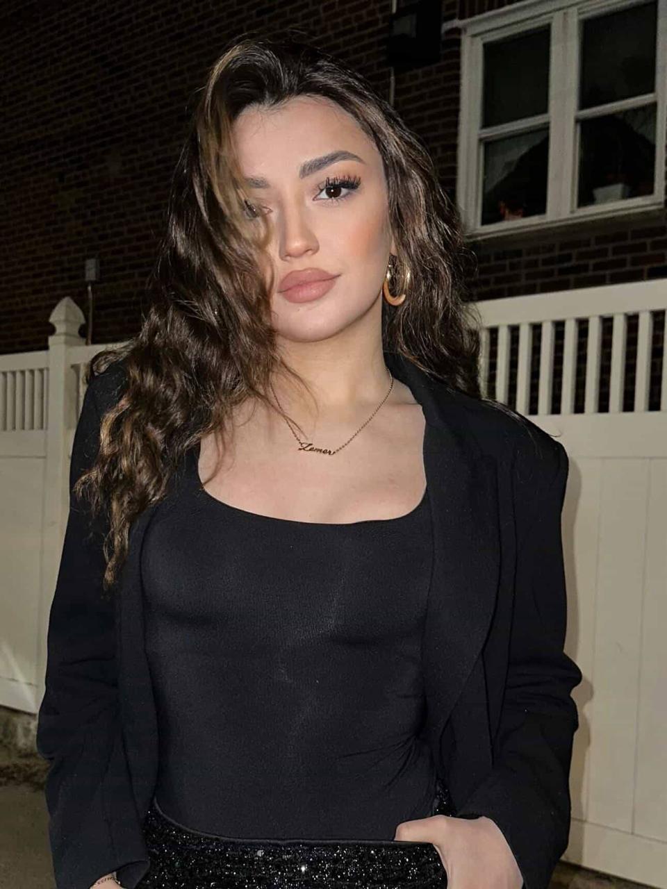 Customer wearing Zemer Script Necklace