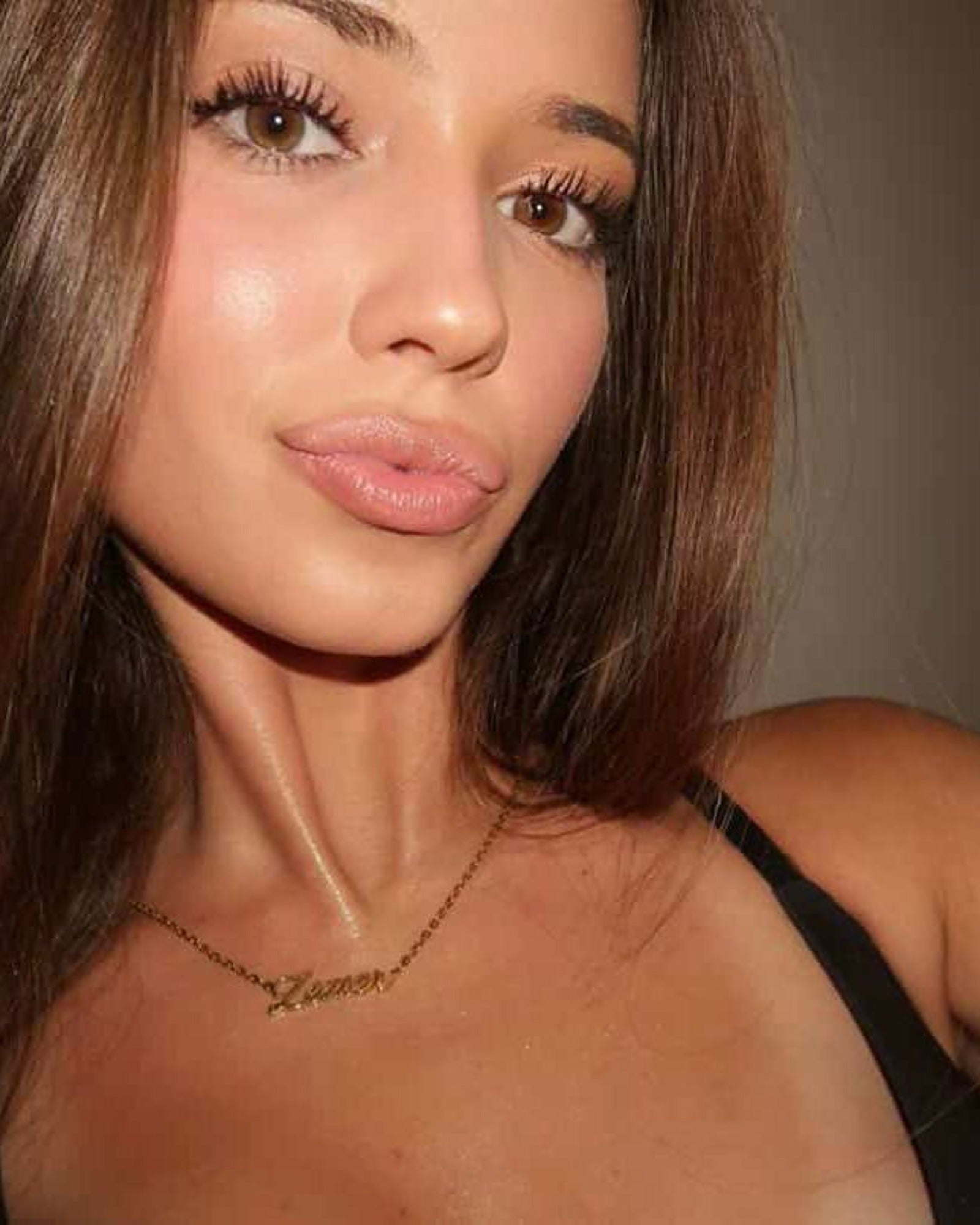 Customer wearing Zemer Script Necklace Gold