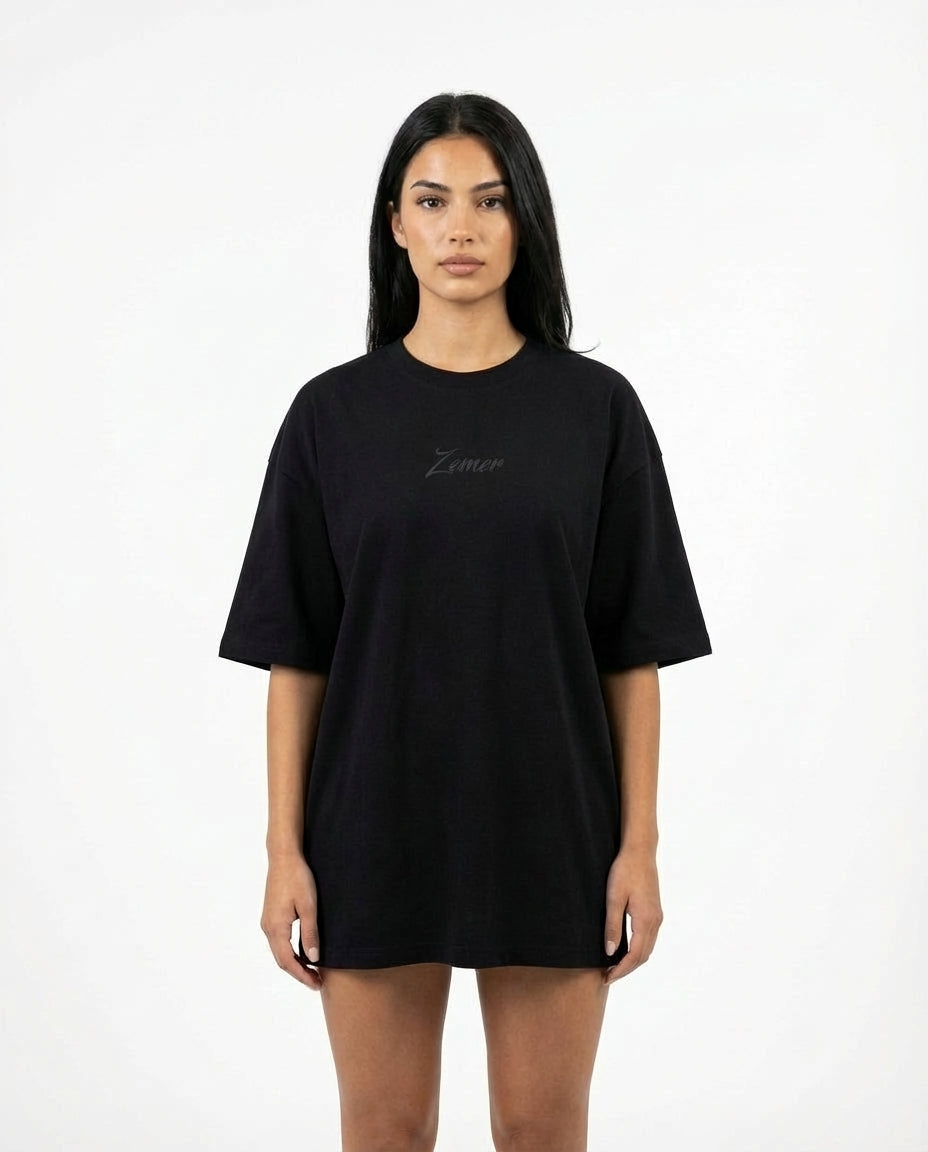 Zemer Script Tee - Women's oversized fit front view, black tee with centered tonal Zemer script