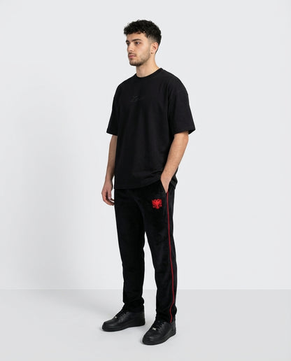 Zemer Script Tee - Men's 3/4 side view with Velour Red Stitch pants